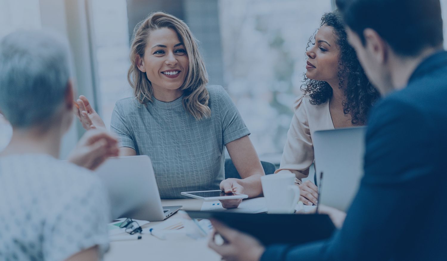 Who should a CISO report to?